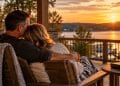 Couple embracing at sunset overlooking a lake, representing God-centered lasting love
